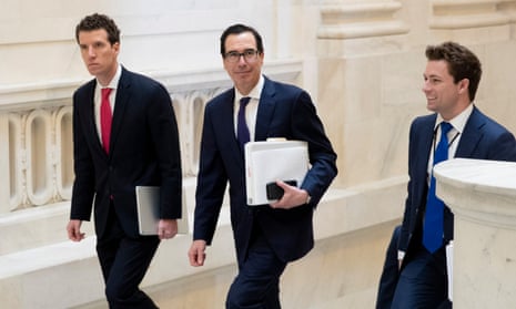 The US treasury secretary, Steven Mnuchin, centre, walks to a Republican policy luncheon, on Capitol Hill in Washington on Wednesday.