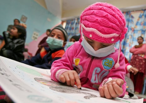 Young cancer patients take part in a painting competition in a hospital in  Chandigarh, northern India.
