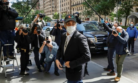 Michael Cohen arrives at home after being released from federal prison due to the coronavirus pandemic in New York, New York, on 21 May. 