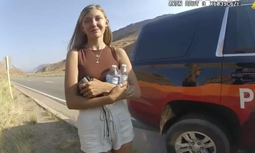 Video from the Moab Police Department shows Gabby Petito talking to a police officer after being arrested with her boyfriend, Brian Laundrie, near the entrance to Arches National Park in August.