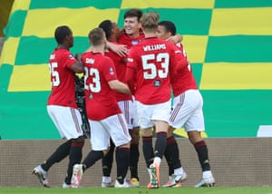 Maguire celebrates after his goal.