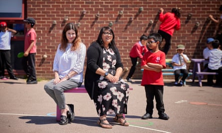 Anne Greaves, left, and Nadia Qayyum in the playground of Queen’s Park academy, Bedford.