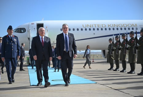 Keir Starmer arriving in Ankara, Turkey, this morning, where he was met by the defence minister, Yasar Guler (left).