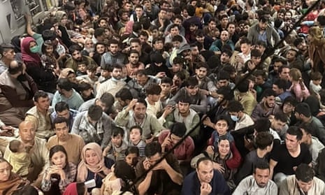 Afghans packed inside a US air force plane in Kabul on 20 August.