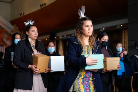 The remains of Moriori are carried out of the marae after a repatriation ceremony at Te Papa Tongarewa national museum in Wellington, New Zealand, on Friday.