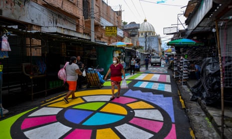 People walk by a local street market in San Salvador, El Salvador. Nayib Bukele government implemented the second phase of reopening the economy after almost six months of restrictions due to the COVID-19 pandemic.