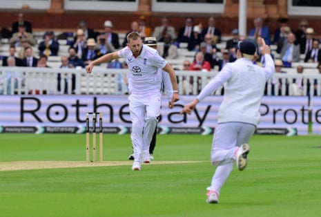 Gus Atkinson of England celebrates taking the wicket of Nathan Smith