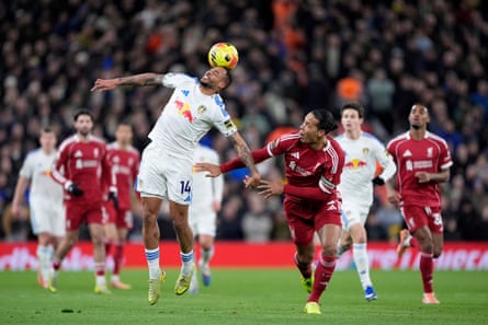 Leeds’s Lukas Nmecha tussles with Virgil van Dijk