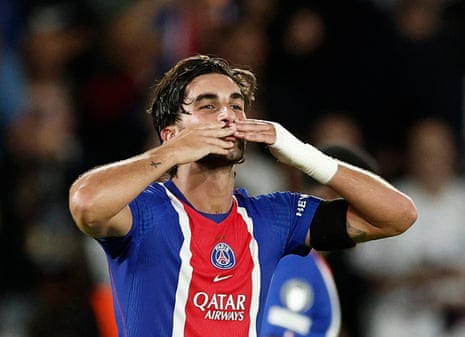 Paris St Germain's Ferran Torres celebrates scoring their third goal.
