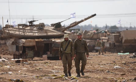 Israeli tanks and soldiers near the Gaza border