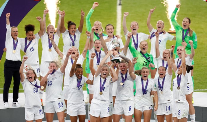 England’s Leah Williamson and Millie Bright lifting the Women’s Euro 2022 trophy
