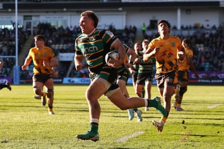 Tom Litchfield breaks clear to score Northampton’s fourth try