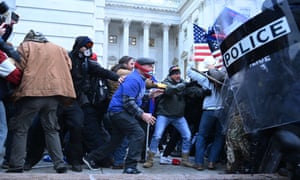 Trump supporters clash with police and security forces as they storm the US Capitol in Washington. Mike Pence and members of Congress were evacuated for their own safety.