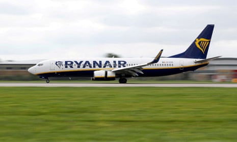 A Ryanair aircraft lands on the southern runway at Gatwick