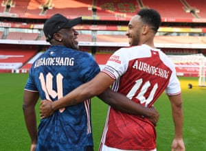 Arsenal’s Pierre-Emerick Aubameyang celebrates his new contract with his father Pierre.
