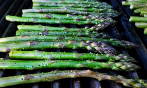 Roasted asparagus on a grill.