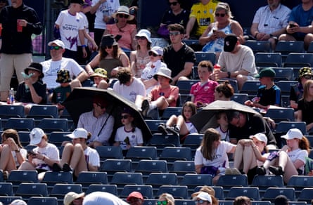 Spectators under umbrellas in the crowd during the Women’s T20 World Cup match at Bristol