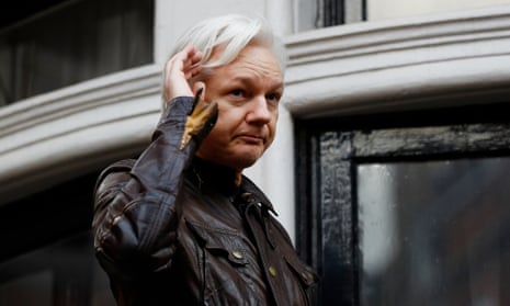 Julian Assange is seen on the balcony of the Ecuadorian embassy in London last year