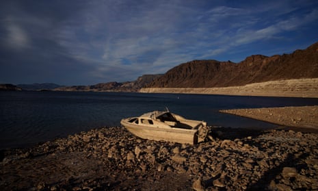 A formerly sunken boat sits high and dry along the shoreline of Lake Mead near Boulder City, Nevada. Drought has caused the lake’s waters to recede.