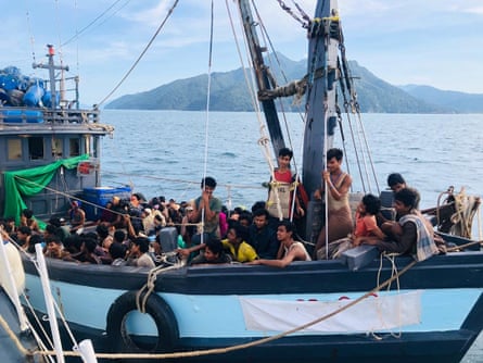 A boat carrying suspected ethnic Rohingya migrants is seen detained in Malaysian territorial waters, in Langkawi, Malaysia, 5 April