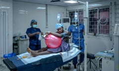A woman receives an anaesthesia injection before an emergency cesarean section at Lagos Island maternity hospital.