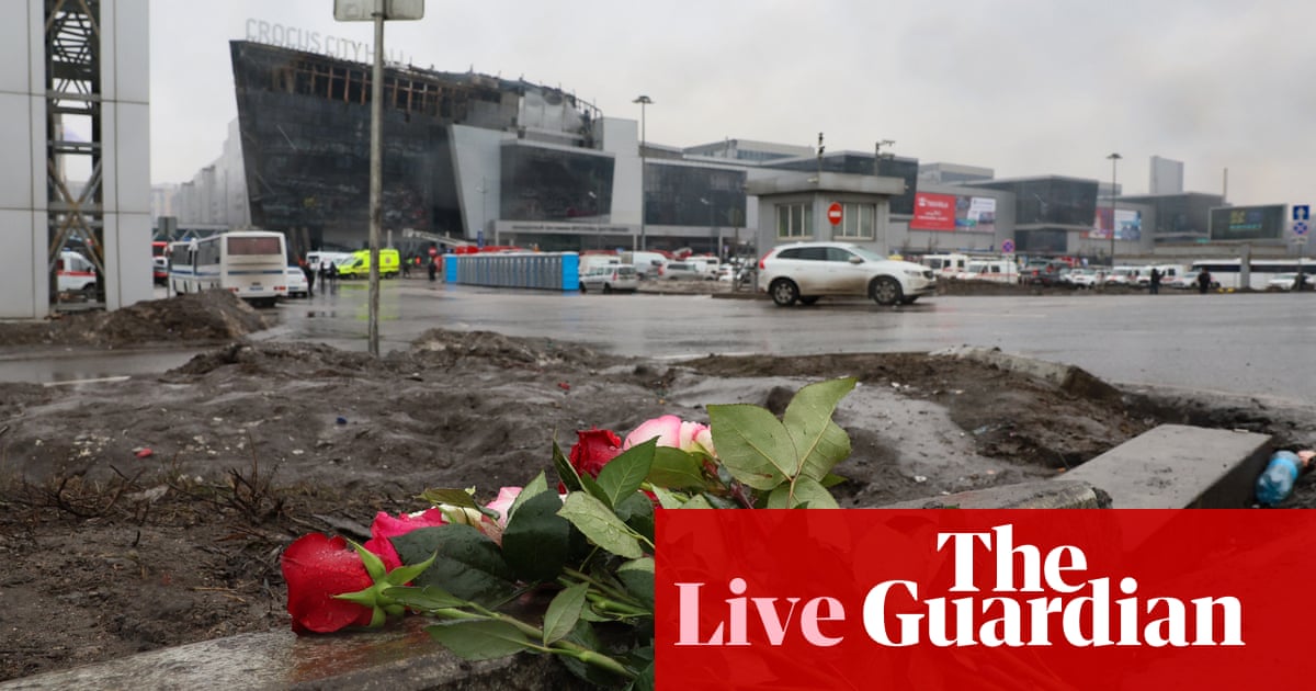 Moscow concert hall attack: death toll rises to 115 as suspects are detained – live updates