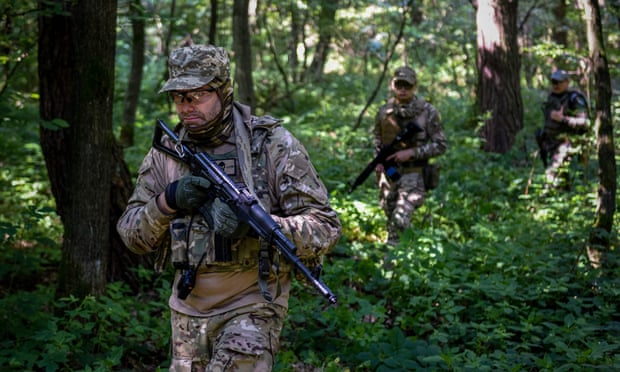 Ukrainian civilians take part in military training in Lviv region