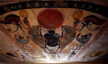 The painted ceilings inside the tomb.