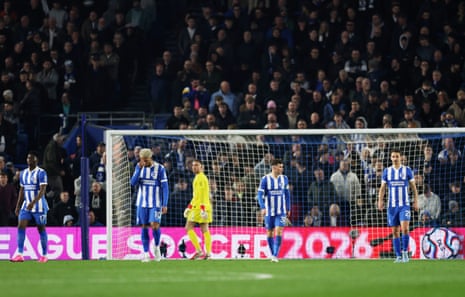 Brighton's Georginio Rutter and teammates look dejected after Arsenal's Bukayo Saka gave the visitors the lead.