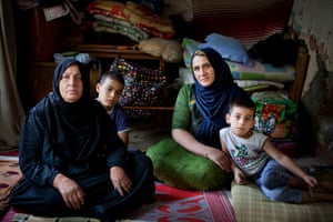Majada Abdul Rachman, her daughter, Amal Abbas Ahmed, and grandsons, in Jalawla, Iraq