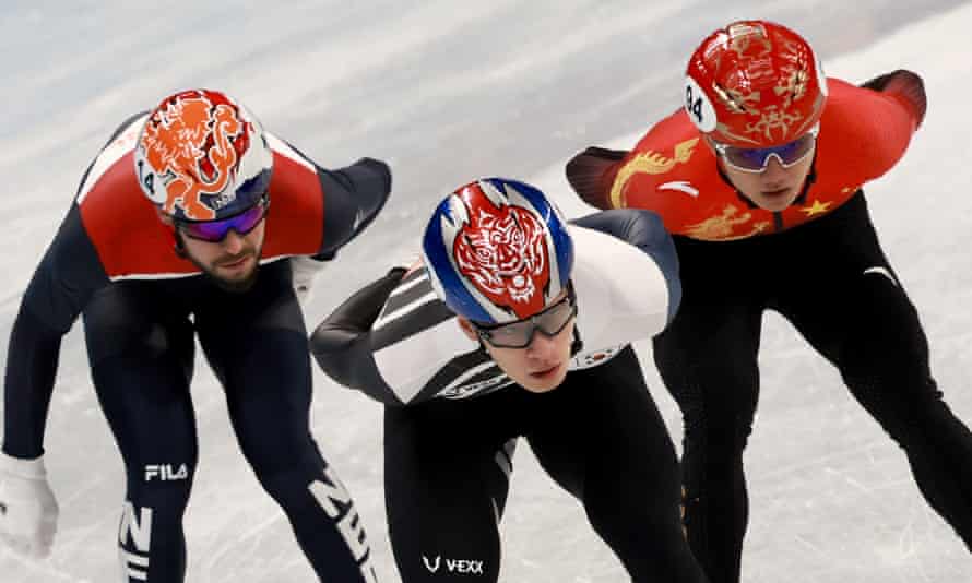 Hwang Dae-heon (centre) of South Korea in action during the men’s 1,000m quarter finals.