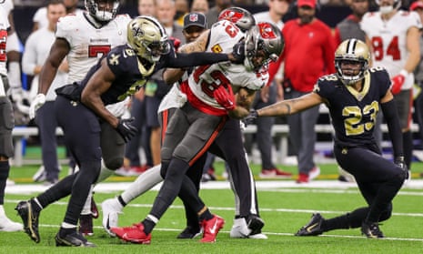 New Orleans Saints cornerback Marshon Lattimore (23) and safety Marcus Maye (6) clash with Tampa Bay Buccaneers wide receiver Mike Evans (13)