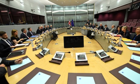 Brexit secretary David Davis and his delegation sit across from the EU’s chief Bexit negotiator Michael Barnier at the start of Brexit negotiations at the European Commission HQ in Brussels.
