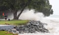 Cyclone Gabrielle Brings Stong Winds And Heavy Rain To New Zealand<br>AUCKLAND, NEW ZEALAND - FEBRUARY 13: People out looking at the effects of Cyclone Gabrielle at Mathesons Bay Beach on the Matakana Coast on February 13, 2023 in Auckland, New Zealand. Forecasters say Auckland residents are about halfway through the cyclone impacts, with a better weather forecast from Wednesday. (Photo by Fiona Goodall/Getty Images) on February 13, 2023 in Auckland, New Zealand.  (Photo by Fiona Goodall/Getty Images)