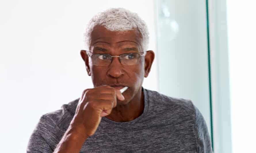 Man brushing his teeth