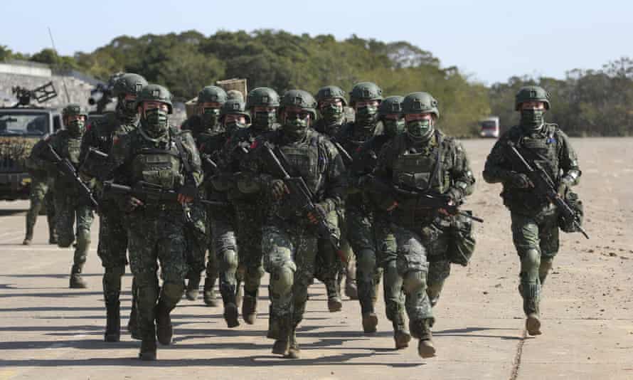 Taiwanese troops using tanks, mortars and small arms staged a drill on Tuesday aimed at repelling an attack from China.