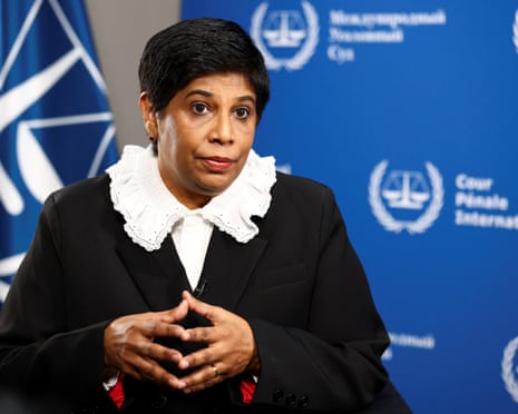 ICC deputy prosecutor Nazhat Shameem Khan gestures while speaking during an interview