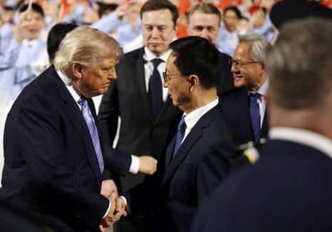 Donald Trump greets vice-president of China Han Zheng.