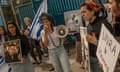 Israeli activists stage a protest at the Unwra office in Jerusalem