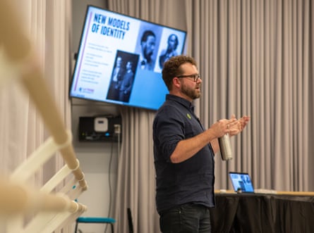 A man speaks to an audience