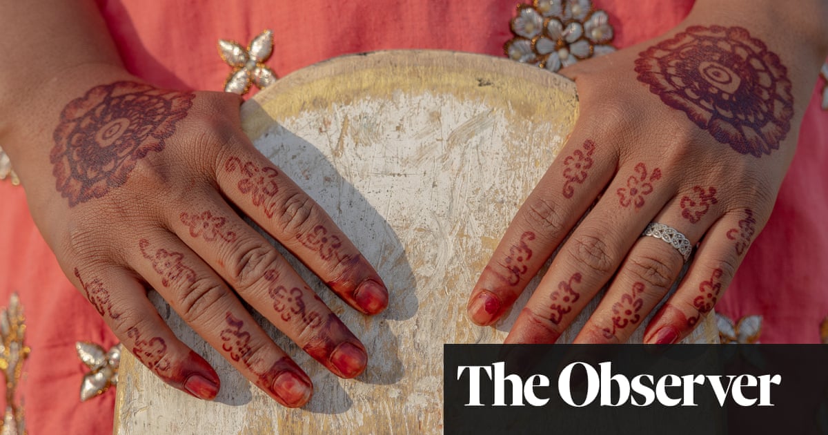 The big picture: a pioneering Indian skater girl shows off her prized board