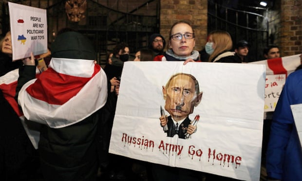Ukrainian supporters protest outside the Russian Embassy in London.