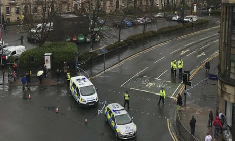 Police secure an area outside the University of Glasgow