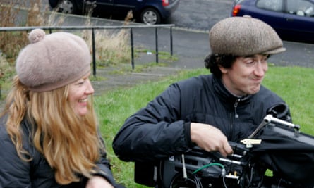 Arnold and Ryan on set, with Ryan holding a camera.