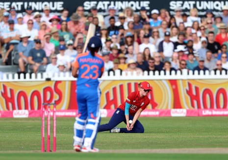 Lauren Bell takes the catch to dismiss Smriti Mandhana.