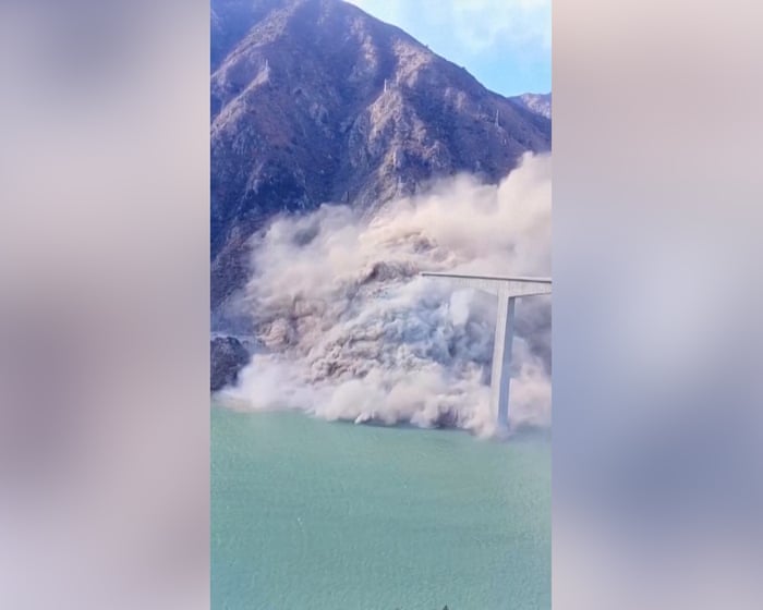 Moment newly opened bridge in China partly collapses – video