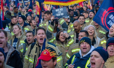 Firefighters march to the Houses of Parliament, London, on Wednesday, as a ballot for strike action gets underway.