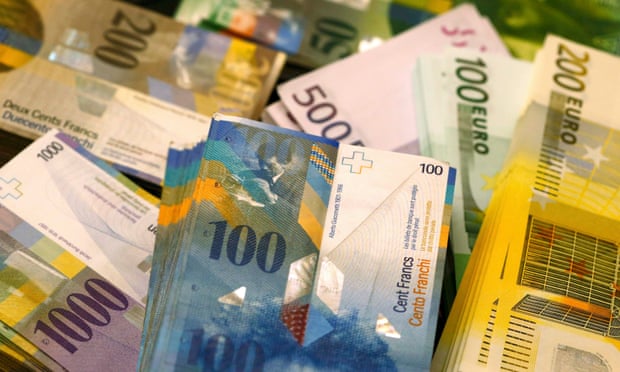 Swiss franc and Euro banknotes.