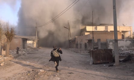 Smoke rises after Russian airstrikes on Saraqib, Idlib province, 6 February.