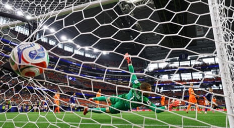 Japan's Keito Nakamura scores their first goal past Netherlands' Bart Verbruggen.
